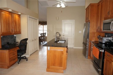 Impressive 3 Bedroom, 2 Bathroom WATERFRONT home with attached 2 on Saint Andrews South Golf Club in Florida - for sale on GolfHomes.com, golf home, golf lot