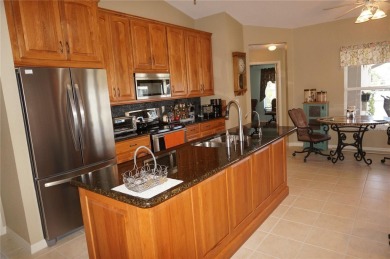 Impressive 3 Bedroom, 2 Bathroom WATERFRONT home with attached 2 on Saint Andrews South Golf Club in Florida - for sale on GolfHomes.com, golf home, golf lot