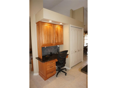 Impressive 3 Bedroom, 2 Bathroom WATERFRONT home with attached 2 on Saint Andrews South Golf Club in Florida - for sale on GolfHomes.com, golf home, golf lot