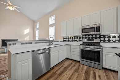 Welcome home to this beautifully maintained 3,061 sq ft on TPC at Wakefield Plantation in North Carolina - for sale on GolfHomes.com, golf home, golf lot