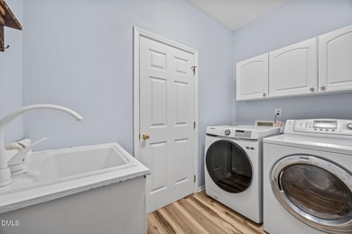 Welcome home to this beautifully maintained 3,061 sq ft on TPC at Wakefield Plantation in North Carolina - for sale on GolfHomes.com, golf home, golf lot