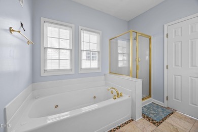 Welcome home to this beautifully maintained 3,061 sq ft on TPC at Wakefield Plantation in North Carolina - for sale on GolfHomes.com, golf home, golf lot