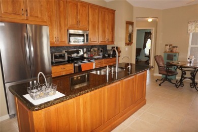 Impressive 3 Bedroom, 2 Bathroom WATERFRONT home with attached 2 on Saint Andrews South Golf Club in Florida - for sale on GolfHomes.com, golf home, golf lot