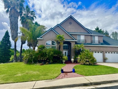 Every day can be a Vacation day amid this palm tree oasis! So on Gold Hills Golf Club in California - for sale on GolfHomes.com, golf home, golf lot