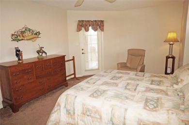 Impressive 3 Bedroom, 2 Bathroom WATERFRONT home with attached 2 on Saint Andrews South Golf Club in Florida - for sale on GolfHomes.com, golf home, golf lot