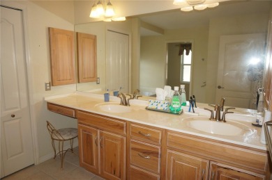 Impressive 3 Bedroom, 2 Bathroom WATERFRONT home with attached 2 on Saint Andrews South Golf Club in Florida - for sale on GolfHomes.com, golf home, golf lot