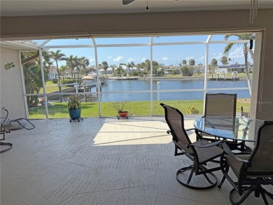 Impressive 3 Bedroom, 2 Bathroom WATERFRONT home with attached 2 on Saint Andrews South Golf Club in Florida - for sale on GolfHomes.com, golf home, golf lot
