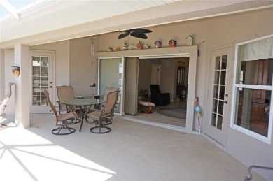 Impressive 3 Bedroom, 2 Bathroom WATERFRONT home with attached 2 on Saint Andrews South Golf Club in Florida - for sale on GolfHomes.com, golf home, golf lot