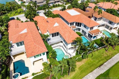 This elegant villa pool home offers 3,222 sf under air & 4,415 on Sailfish Point Golf Club, Inc. in Florida - for sale on GolfHomes.com, golf home, golf lot