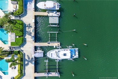 This elegant villa pool home offers 3,222 sf under air & 4,415 on Sailfish Point Golf Club, Inc. in Florida - for sale on GolfHomes.com, golf home, golf lot
