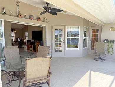 Impressive 3 Bedroom, 2 Bathroom WATERFRONT home with attached 2 on Saint Andrews South Golf Club in Florida - for sale on GolfHomes.com, golf home, golf lot