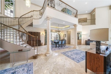 This elegant villa pool home offers 3,222 sf under air & 4,415 on Sailfish Point Golf Club, Inc. in Florida - for sale on GolfHomes.com, golf home, golf lot