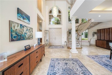 This elegant villa pool home offers 3,222 sf under air & 4,415 on Sailfish Point Golf Club, Inc. in Florida - for sale on GolfHomes.com, golf home, golf lot