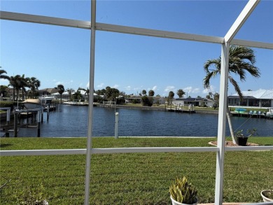 Impressive 3 Bedroom, 2 Bathroom WATERFRONT home with attached 2 on Saint Andrews South Golf Club in Florida - for sale on GolfHomes.com, golf home, golf lot