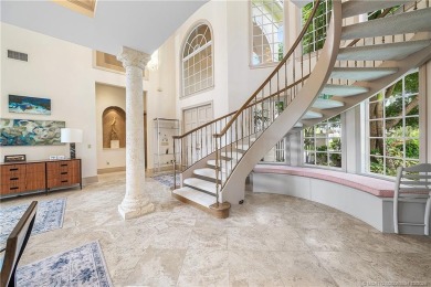 This elegant villa pool home offers 3,222 sf under air & 4,415 on Sailfish Point Golf Club, Inc. in Florida - for sale on GolfHomes.com, golf home, golf lot