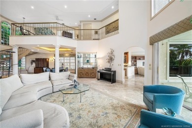 This elegant villa pool home offers 3,222 sf under air & 4,415 on Sailfish Point Golf Club, Inc. in Florida - for sale on GolfHomes.com, golf home, golf lot