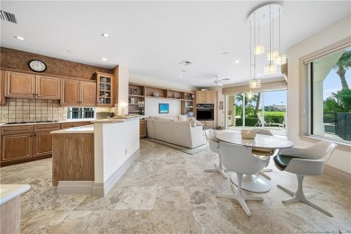 This elegant villa pool home offers 3,222 sf under air & 4,415 on Sailfish Point Golf Club, Inc. in Florida - for sale on GolfHomes.com, golf home, golf lot