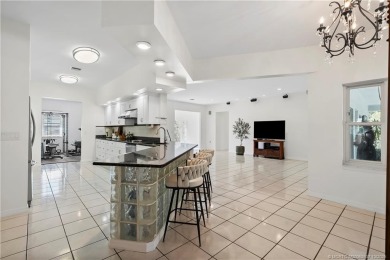 ired of seeing the same cookie-cutter homes? This custom 3BR/3BA on The Saints At Port St Lucie Golf Course in Florida - for sale on GolfHomes.com, golf home, golf lot