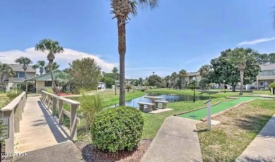 2BR/2.5BA END UNIT townhome with private back patio in a gated on Edgewater Beach Resort in Florida - for sale on GolfHomes.com, golf home, golf lot