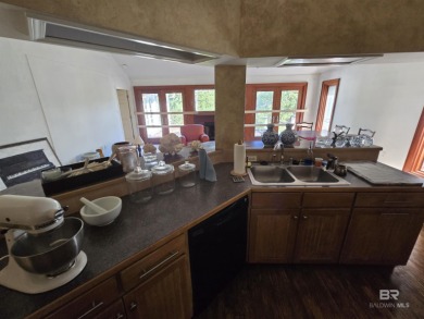 Unlock the potential of this lake home on highly sought-after on Lake Forest Yacht and Country Club in Alabama - for sale on GolfHomes.com, golf home, golf lot