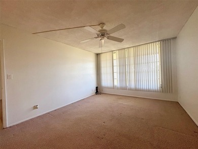 Experience spacious living in this 1BR/1.5BA condo in Palm Aire on Palm-Aire Country Club and Resort - Palms in Florida - for sale on GolfHomes.com, golf home, golf lot