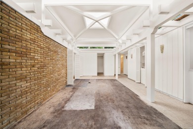 The stunning timeless architecture of these condominiums on Belvedere Golf Club in Arkansas - for sale on GolfHomes.com, golf home, golf lot