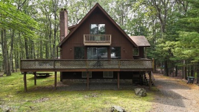 Tucked at the end of a quiet cul-de-sac and overlooking a on Paupack Hills Golf and Country Club in Pennsylvania - for sale on GolfHomes.com, golf home, golf lot