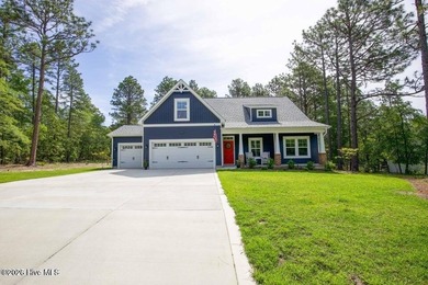 Experience the charm of 125 Lancashire Ln., nestled in the heart on Seven Lakes Country Club in North Carolina - for sale on GolfHomes.com, golf home, golf lot