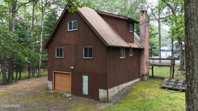 Tucked at the end of a quiet cul-de-sac and overlooking a on Paupack Hills Golf and Country Club in Pennsylvania - for sale on GolfHomes.com, golf home, golf lot