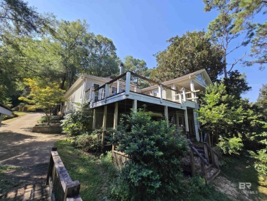 Unlock the potential of this lake home on highly sought-after on Lake Forest Yacht and Country Club in Alabama - for sale on GolfHomes.com, golf home, golf lot