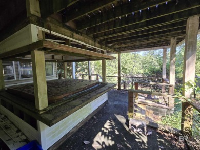 Unlock the potential of this lake home on highly sought-after on Lake Forest Yacht and Country Club in Alabama - for sale on GolfHomes.com, golf home, golf lot