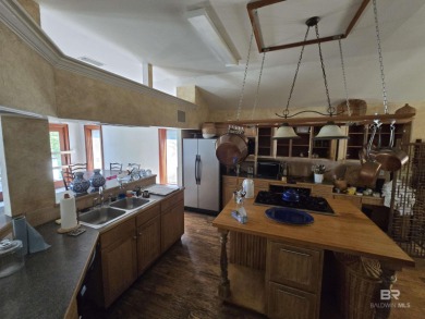 Unlock the potential of this lake home on highly sought-after on Lake Forest Yacht and Country Club in Alabama - for sale on GolfHomes.com, golf home, golf lot