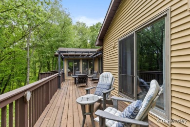 Welcome to your private oasis! This stunning 5-bedroom, 3.5-bath on Stonehenge Golf Club in Michigan - for sale on GolfHomes.com, golf home, golf lot