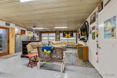 Welcome to your private oasis! This stunning 5-bedroom, 3.5-bath on Stonehenge Golf Club in Michigan - for sale on GolfHomes.com, golf home, golf lot