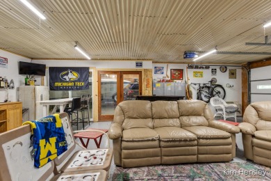 Welcome to your private oasis! This stunning 5-bedroom, 3.5-bath on Stonehenge Golf Club in Michigan - for sale on GolfHomes.com, golf home, golf lot