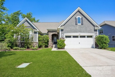 Experience lakefront living in this stunning 4-bedroom, 3.5-bath on The Palisades Country Club in North Carolina - for sale on GolfHomes.com, golf home, golf lot