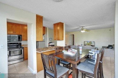 Spacious 2 bed, 2 bath condo with a private balcony and golf on Inverrary Country Club in Florida - for sale on GolfHomes.com, golf home, golf lot