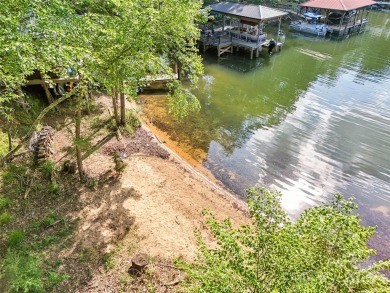 Experience lakefront living in this stunning 4-bedroom, 3.5-bath on The Palisades Country Club in North Carolina - for sale on GolfHomes.com, golf home, golf lot