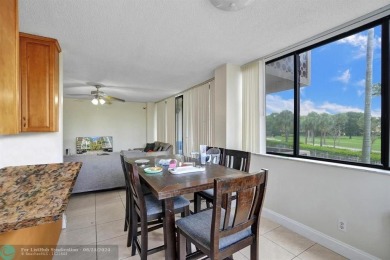 Spacious 2 bed, 2 bath condo with a private balcony and golf on Inverrary Country Club in Florida - for sale on GolfHomes.com, golf home, golf lot