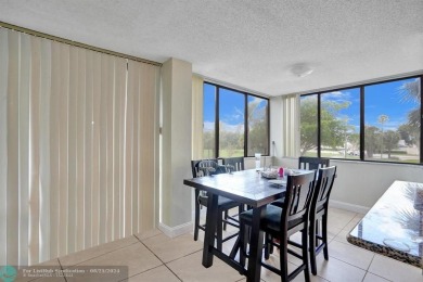 Spacious 2 bed, 2 bath condo with a private balcony and golf on Inverrary Country Club in Florida - for sale on GolfHomes.com, golf home, golf lot