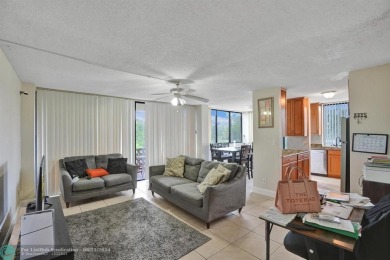 Spacious 2 bed, 2 bath condo with a private balcony and golf on Inverrary Country Club in Florida - for sale on GolfHomes.com, golf home, golf lot
