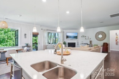 Experience lakefront living in this stunning 4-bedroom, 3.5-bath on The Palisades Country Club in North Carolina - for sale on GolfHomes.com, golf home, golf lot