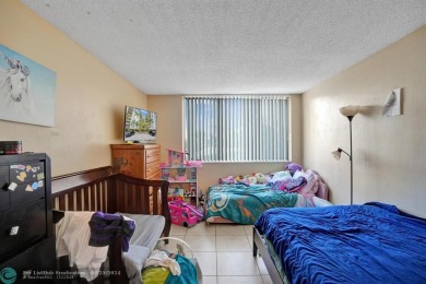 Spacious 2 bed, 2 bath condo with a private balcony and golf on Inverrary Country Club in Florida - for sale on GolfHomes.com, golf home, golf lot