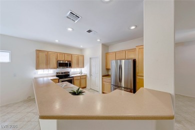 This energy-efficient Monroe model offers the perfect blend of on Revere Golf Club in Nevada - for sale on GolfHomes.com, golf home, golf lot