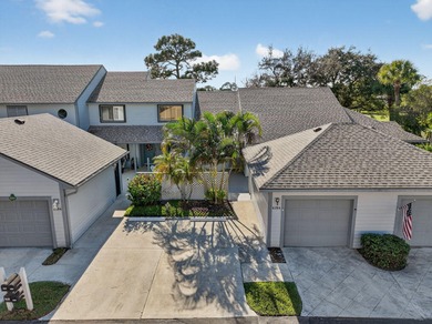 Enjoy stunning lake and golf course views right from your living on Heritage Ridge Golf Club in Florida - for sale on GolfHomes.com, golf home, golf lot