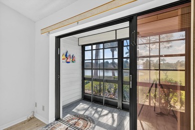 Enjoy stunning lake and golf course views right from your living on Heritage Ridge Golf Club in Florida - for sale on GolfHomes.com, golf home, golf lot