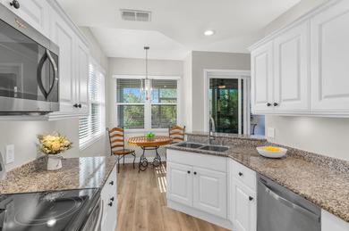 Welcome to this elegant, end unit, first-floor condo located in on Silver Lakes Resort and Golf Club in Florida - for sale on GolfHomes.com, golf home, golf lot