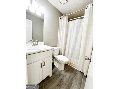 This charming 3-bedroom, 2-bath ranch offers comfortable, easy on Golf Club of Macon in Georgia - for sale on GolfHomes.com, golf home, golf lot