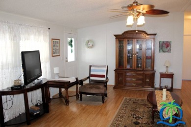 **Charming Waterfront Retreat in Florida!** NEW ROOF 2025! on Cypresswood Golf and Country Club in Florida - for sale on GolfHomes.com, golf home, golf lot