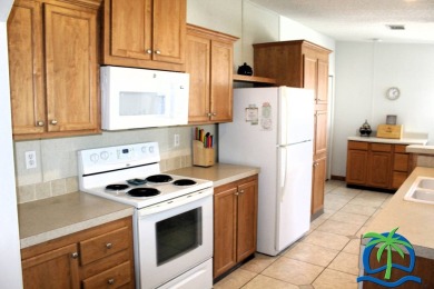 **Charming Waterfront Retreat in Florida!** NEW ROOF 2025! on Cypresswood Golf and Country Club in Florida - for sale on GolfHomes.com, golf home, golf lot